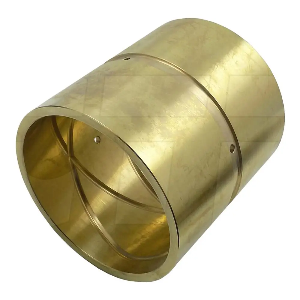 A bronze bushing with visible oil grooves